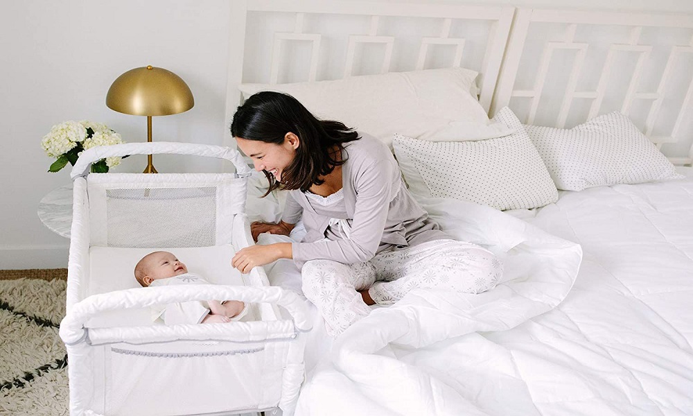 What is a bedside bassinet?